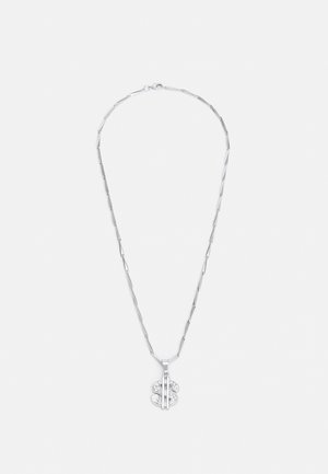 Collier en argent avec des maillons allongés et un pendentif en forme de signe dollar, agrémenté de cristaux transparents.