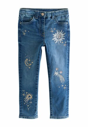 Blaue Denim-Jeggings mit schmaler Passform, die mit metallischen Stickereien von Sternen, Sonne und Mond an den Beinen versehen sind. Standardmäßiges Fünf-Taschen-Design.
