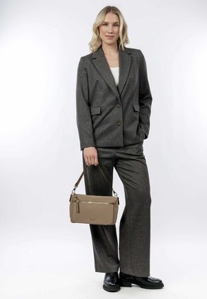 Gray tailored suit with a light texture, featuring a single-breasted jacket and wide-legged pants. Beige handbag with a zipper detail. Black boots.