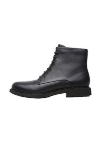 Bottes noires en cuir, mi-mollet, à bout rond, avec des lacets, texture lisse et semelle en caoutchouc robuste. Apparence minimaliste et élégante.