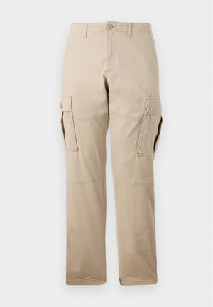 Beige Cargo-Hosen aus Baumwolle, mit geradem Bein, mehreren Seitentaschen und einem Knopfverschluss. Insgesamt glatte Textur.