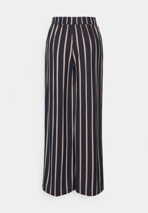 Marineblauwe broek met wijde pijpen, verticale witte, oranje en beige strepen en een elastische tailleband.
