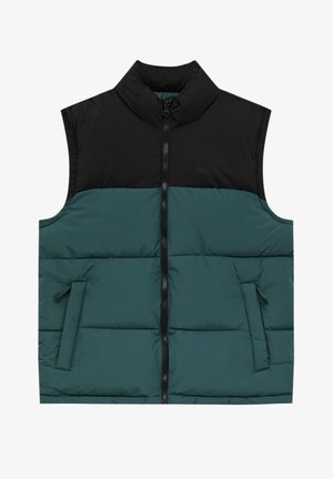 Smanicato imbottito con zip frontale completa, collo alto, parte superiore nera a blocchi di colore e parte inferiore verde scuro, due tasche laterali con zip.