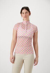 Kortermet polo-skjorte i rosa og krem med geometrisk mønster. Har h�øy krage og glidelås. Slim-fit design med en glatt tekstur.