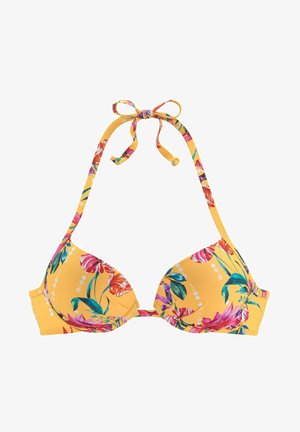 Gelber Blumenbikini mit dreieckigen Cups, verstellbaren Krawattenriemen und lebhaften Motiven von pinken und grünen Blumen auf einem glatten Stoff.
