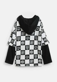 Svart och vitt huvtröja med ett rutmönster som har Marvel-logotyper och text. Korta ärmar med en solid svart accent på sidorna.