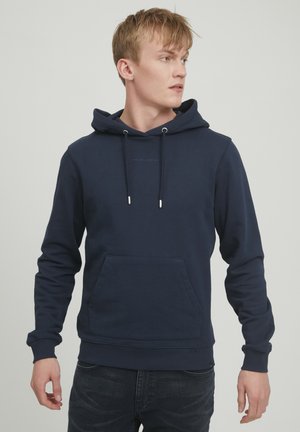 Navy blue hoodie made of soft fabric, featuring a front pocket, drawstring hood, and subtle branding centered on the chest.