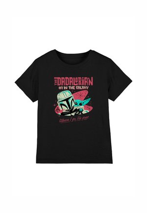 Black t-shirt with teal and pink Mandalorian helmet and Baby Yoda graphic, text "The Dadalorian #1 in the Galaxy" and "Where I go, He goes."
