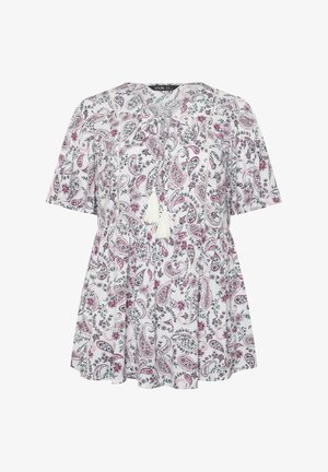 Weiße kurzärmelige Bluse mit rosa- und grünen Paisley-Blumenmuster, Bindeband am Ausschnitt mit weißen Quasten, lockerer Schnitt und geraffte Taille.