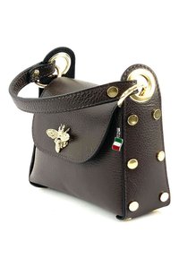Brown leather handbag with a flap closure, gold bee embellishment, gold hardware accents, and gold studs on the sides.