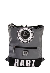 Gray and black backpack with a glossy finish. Features a front zip pocket and circular logo with text. Large "HARZ" print on the bottom.