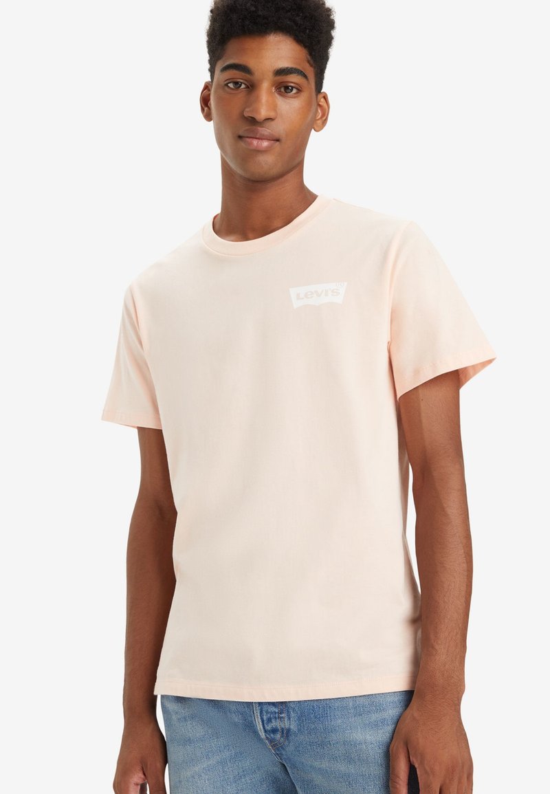 Levi's® GRAPHIC CREWNECK TEE - Nyomott mintás póló - pale peach