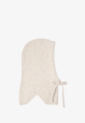 Beige ribbattuotteet lippalakki, jossa on pyöreä huippu ja reunus, pehmeä tekstuuri ja kärkimuotoilu.