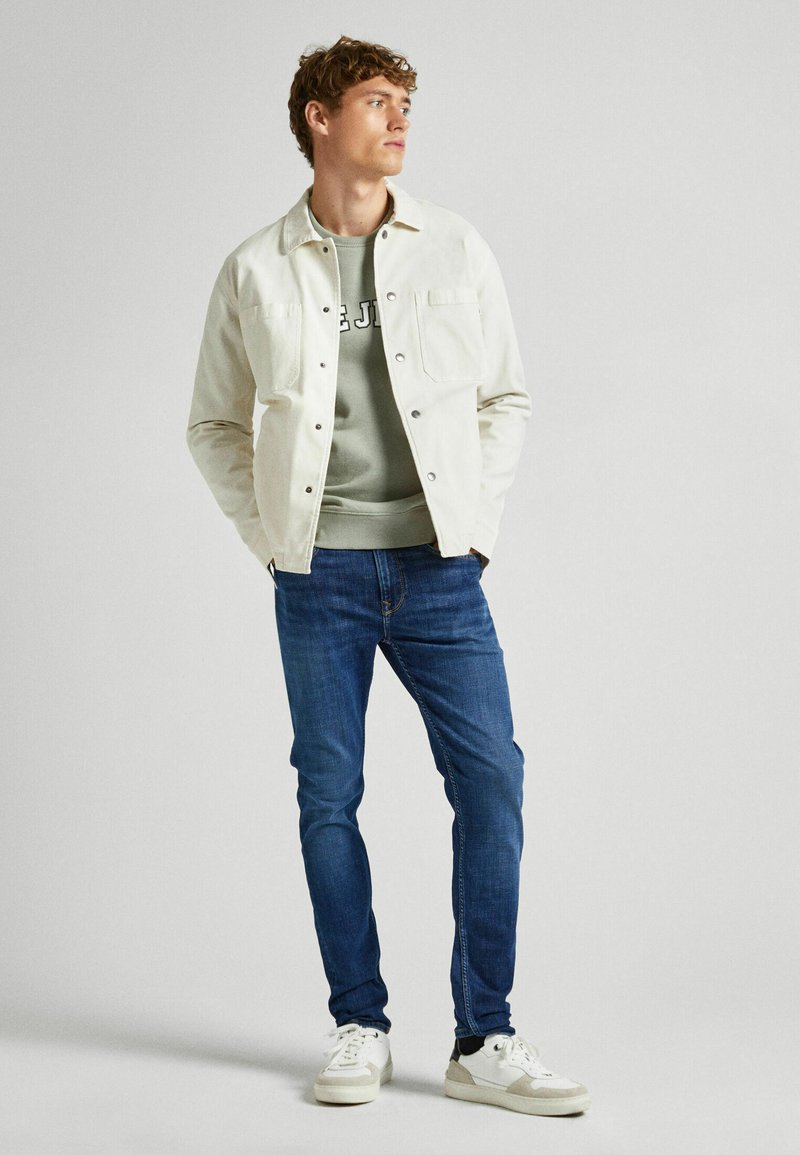 Blugi slim fit