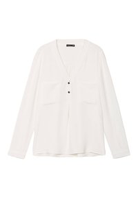 Blouse blanche à manches longues en tissu léger, dotée d'un décolleté en V profond, de deux poches avant et de trois boutons noirs le long du patte de boutonnage.