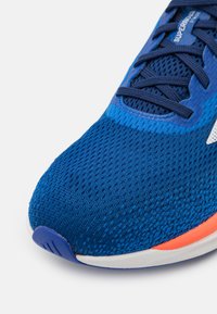 adidas Performance SUPERNOVA STRIDE - Road running shoes - blue/footwear white/team royal blue