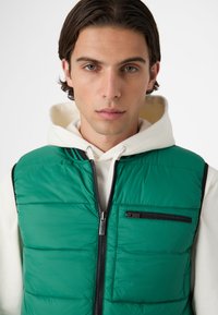 Fila REVERSIBLE  - Väst - black