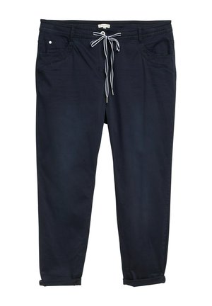 Pantalones de corte relajado en azul marino, con cintura ajustable, dos bolsillos frontales, bajos enrollados y una textura suave.