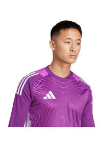 Paarse lange mouwen sportshirt met witte accenten en dynamische golfpatronen, voorzien van een ronde hals en drie witte strepen op de schouders.