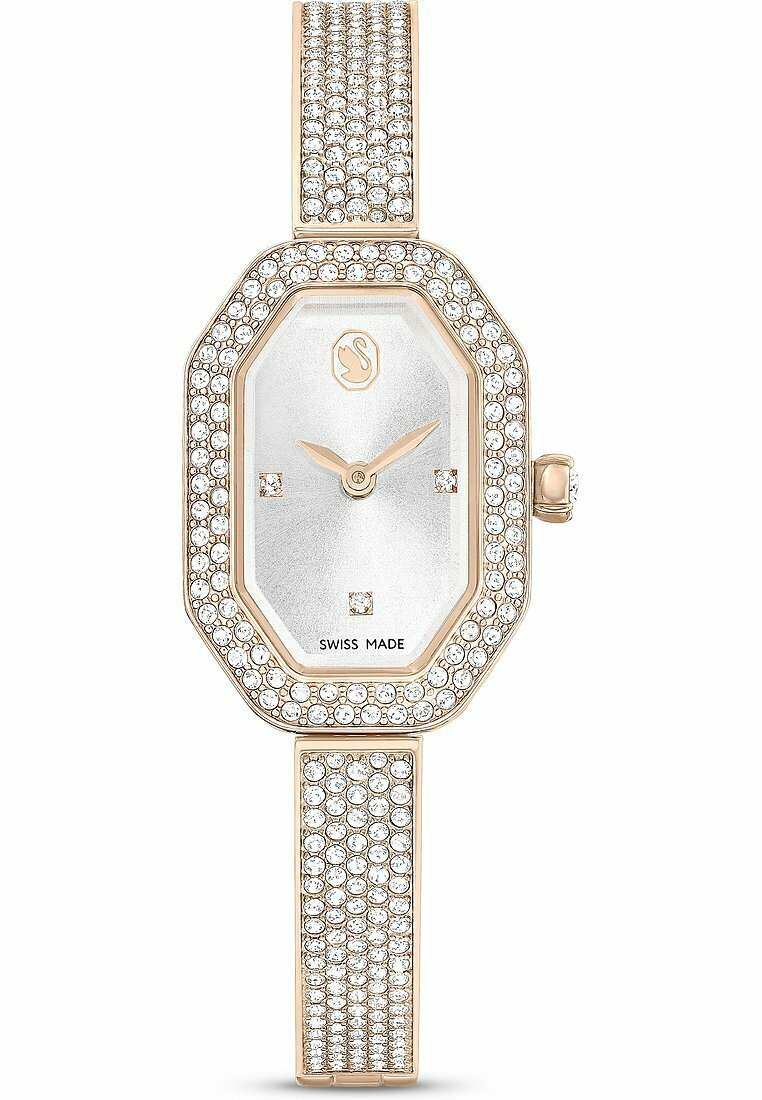 Ośmiokątny zegarek z srebrną tarczą, różowo-złotymi akcentami oraz lśniącymi kryształkami na obrzeżu i bransoletce, które nadają mu błyszczący efekt.