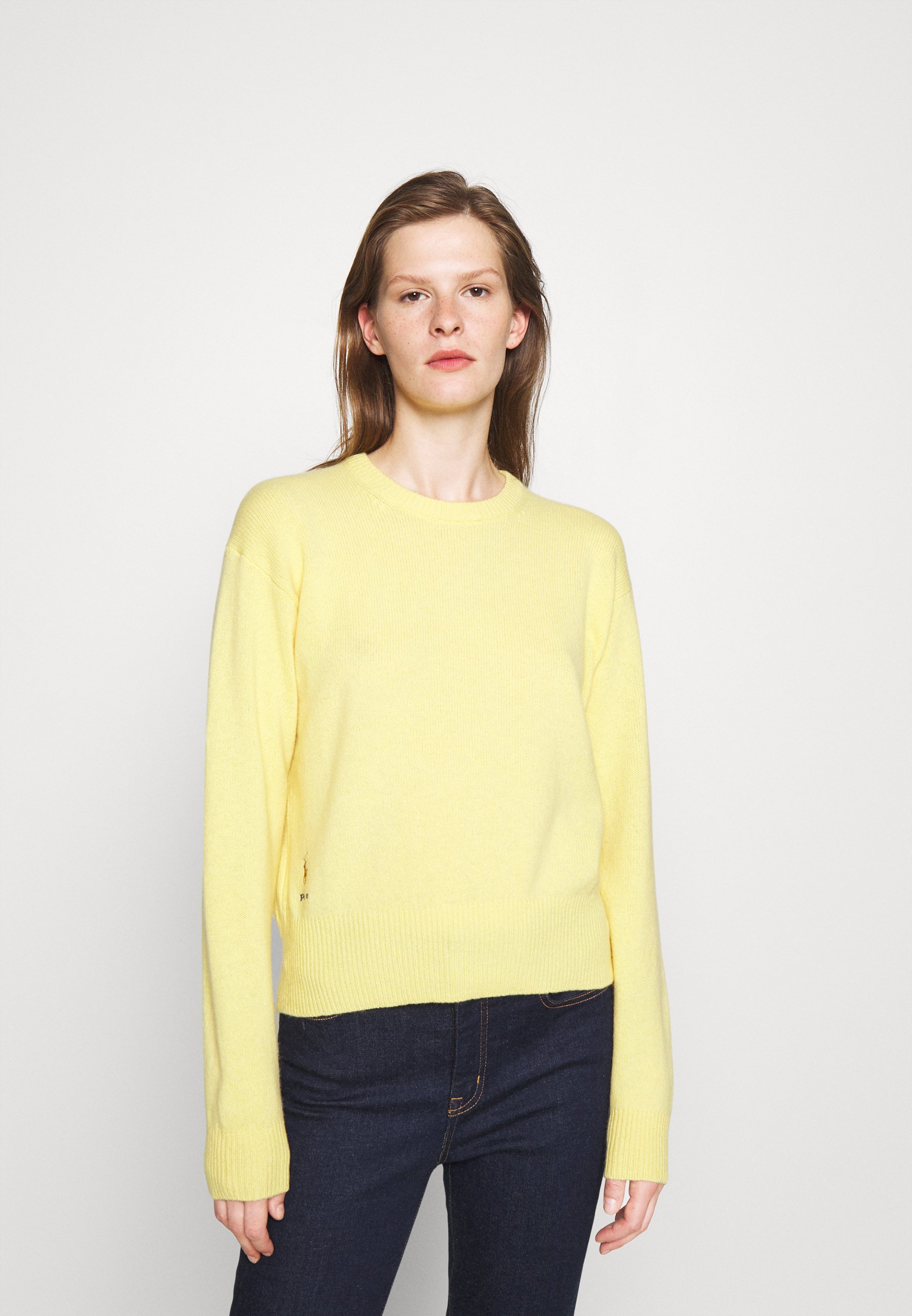 long yellow sweater