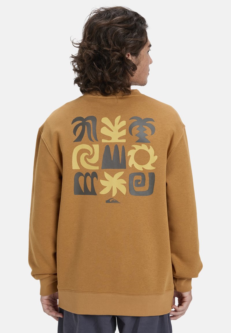 Felpa marrone con un grande design grafico sulla schiena, caratterizzato da forme astratte in giallo e grigio. Tessuto morbido con una vestibilità comoda.