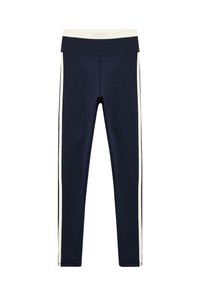 Marineblauwe legging met een brede crèmekleurige tailleband, voorzien van crèmekleurige zijstrepen en een soepele, rekbare textuur. Geen zichtbare hardware of patronen.