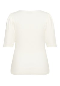 Vit kortärmad blus med puffärmar och figurnära midja, sedd bakifrån mot en enfärgad bakgrund.