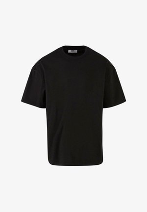 Must mustreest T-särk lühikeste varrukatega, ümmarguse kaelusega ja mugava lõikega. Sile tekstuur, pole nähtavaid mustreid ega kaunistusi.