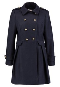 Cappotto in misto lana blu navy con fronte doppiopetto, bottoni dorati, forma sagomata e tasche laterali. Presenta un colletto e polsini regolabili.