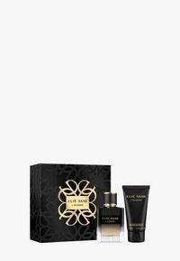Elie Saab L'Homme doftset som består av en svart och guld låda, en transparent glasflaska med vertikala linjer och en svart duschgelsrör.
