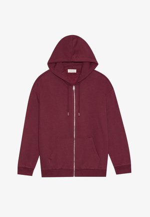 Burgundy zip-up hoodie made from soft cotton, featuring a front pocket, adjustable drawstring hood, and ribbed cuffs and hem.