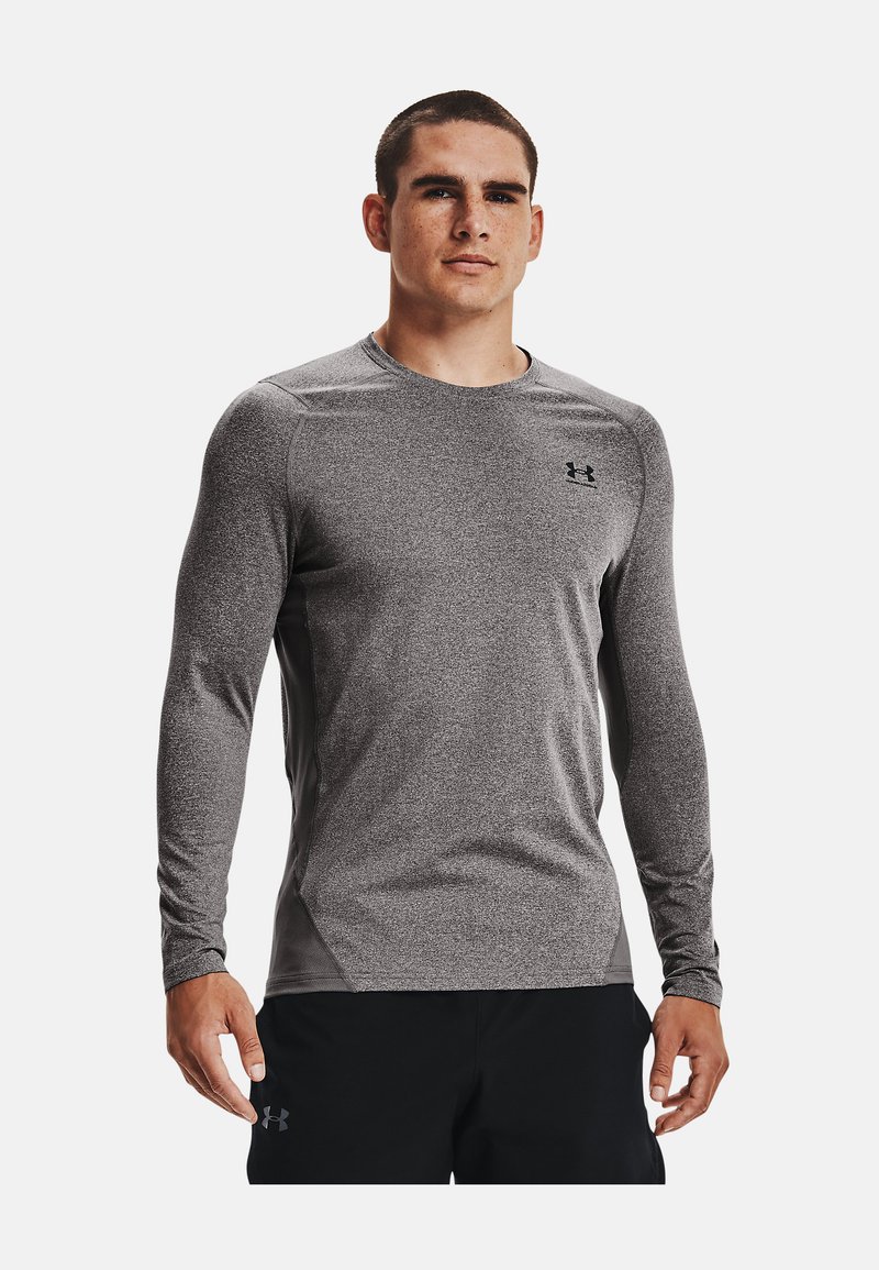Camisa de desporto de manga longa em cinza mescla com uma textura suave, decote redondo e detalhes cosidos; apresenta o logótipo da Under Armour no peito.