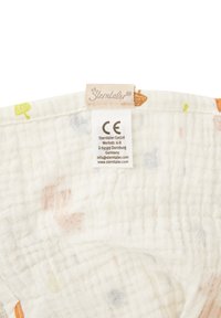 Muslin fabric with a textured surface, featuring a white base and colorful tree and leaf patterns. Includes care label and brand tag.