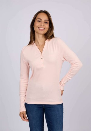 Polo shirt à manches longues rose clair avec un patte de boutonnage à deux boutons. Tissu doux, design ajusté et poignets côtelés. Style décontracté.