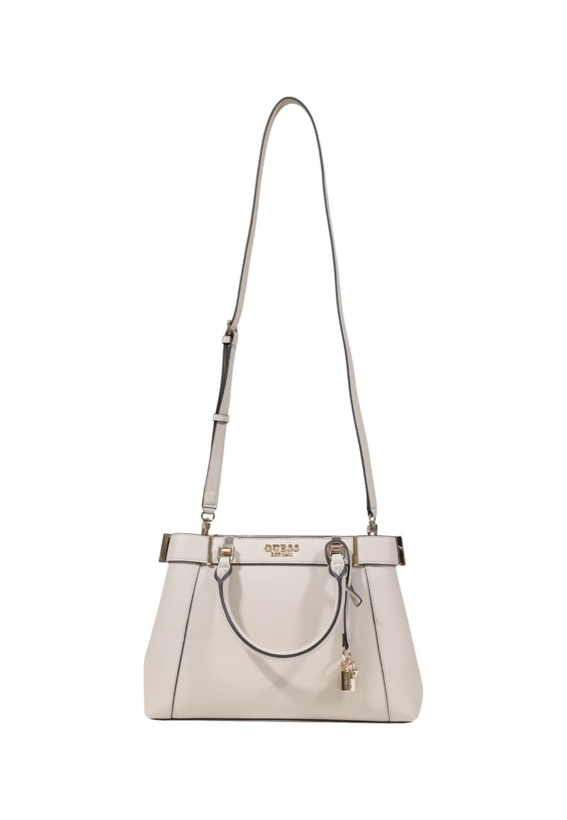 Sac à main beige en simili cuir avec quincaillerie en argent, poignées doubles, sangle ajustable et un petit cadenas décoratif.