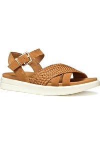 Tan suède sandalen met een geweven detail over de bovenkant, verstelbare enkelband en een witte rubberen zool. Glad textuur, open ontwerp voor ademend vermogen.
