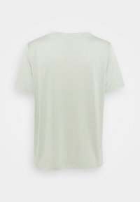 Top met korte mouwen in lichtgroen, gemaakt van gladde stof. Heeft een ronde halslijn en een losse pasvorm met rechte zoom en minimale naden.