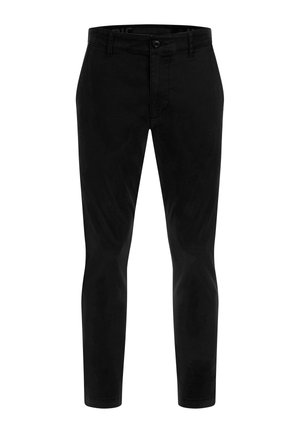 Musta housut, jotka on valmistettu sileästä kankaasta, slim fit -muotoilu, vetoketjukiinnitys ja napitussulku. Ei näkyviä kuvioita tai koristeita.