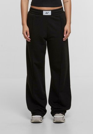 NICE - Tracksuit bottoms - jetblack