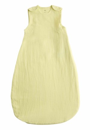 Gigoteuse bébé en coton jaune pâle avec pressions aux épaules et un bas ample et arrondi pour plus de confort.