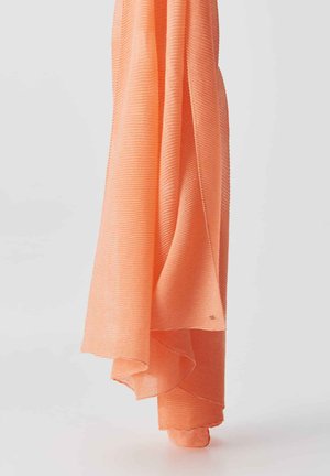 Coral-pink striped scarf with a soft, textured fabric. Features flowing shape, with a slightly transparent quality and subtle fringed edges.