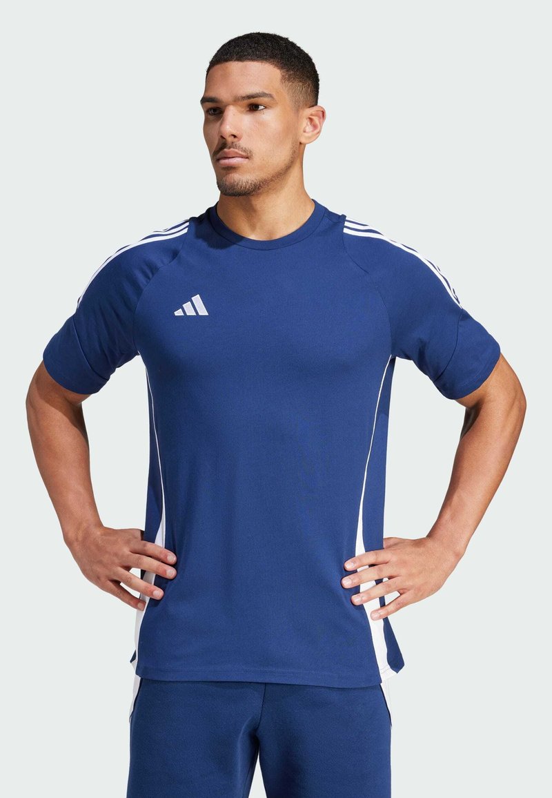 Blue athletic t-shirt made of breathable fabric, featuring white side stripes and an Adidas logo on the left chest. Short sleeves, relaxed fit.