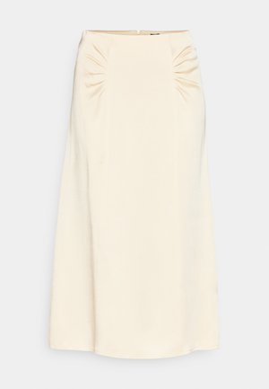 Falda midi color crema con detalle fruncido en la cintura y una textura suave y elegante. Presenta una cremallera lateral para el cierre.