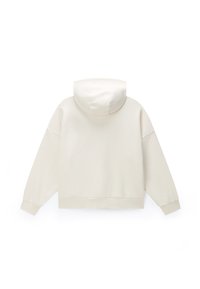 Vue arrière d'un sweat à capuche uni beige clair avec manches longues et poignets et ourlet côtelés.