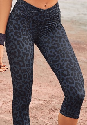 Schwarze und dunkelblaue Leopardenmuster-Leggings mit einem hohen Bund und einem glatten, elastischen Stoff. Verfügt über flache Nähte für Komfort und Passform.