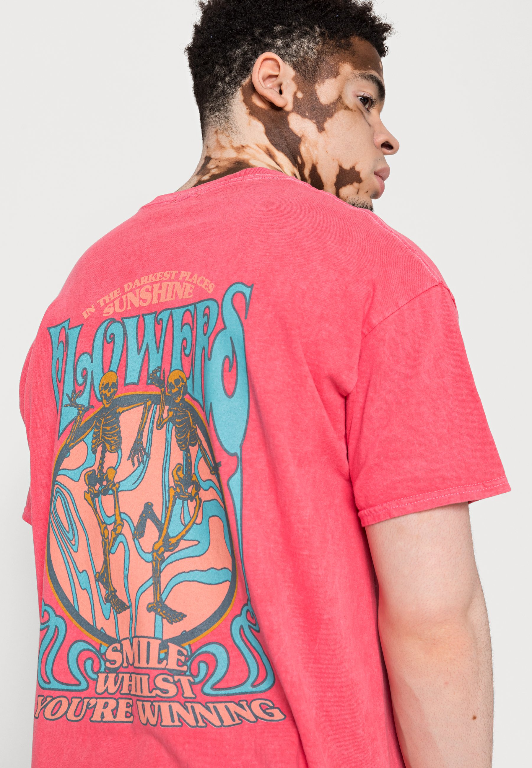 urban outfitters pink skeleton shirt