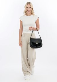 Tamaris CARO - Handtasche - black