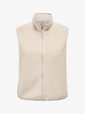 Chaleco de forro polar en crema, con cuello alto, cremallera frontal y superficie texturizada. Diseñado sin mangas para un abrigo en capas.