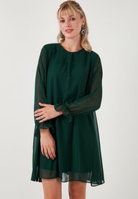 Unselected, emerald green